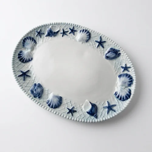 Große Schale blaue Muscheln