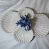 Vierfache Muschelschale blaues Korallenmotiv